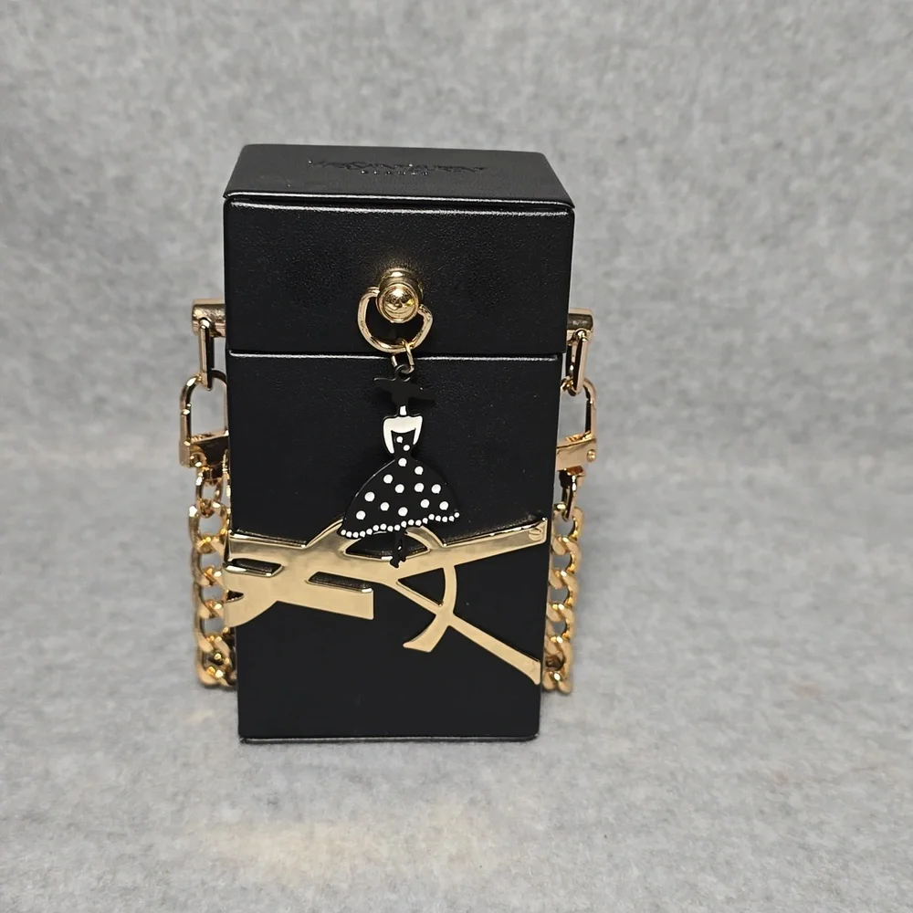 Yves Saint Laurent Beaute Black and Gold Mini Bag